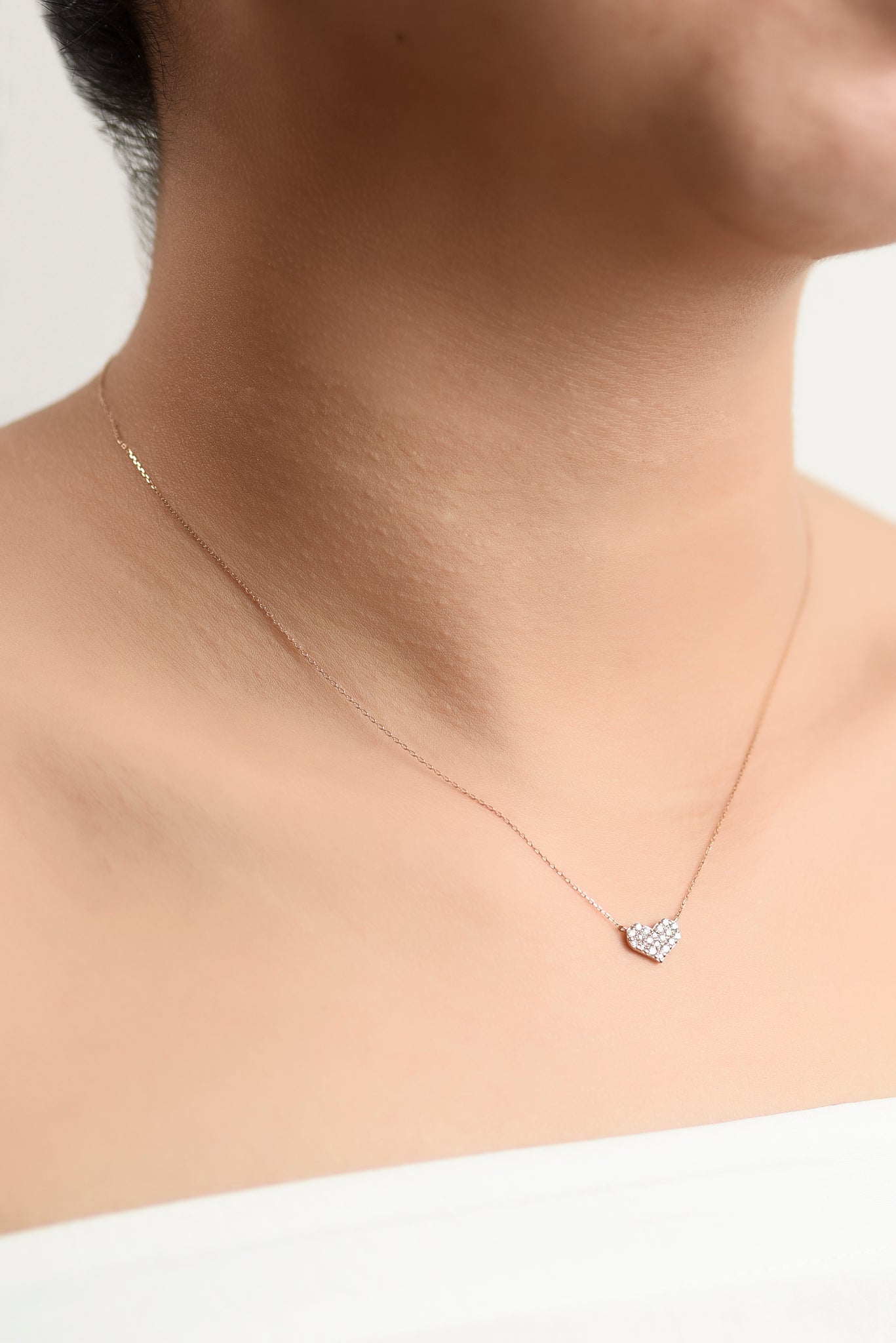 Tiny diamond hot sale heart necklace